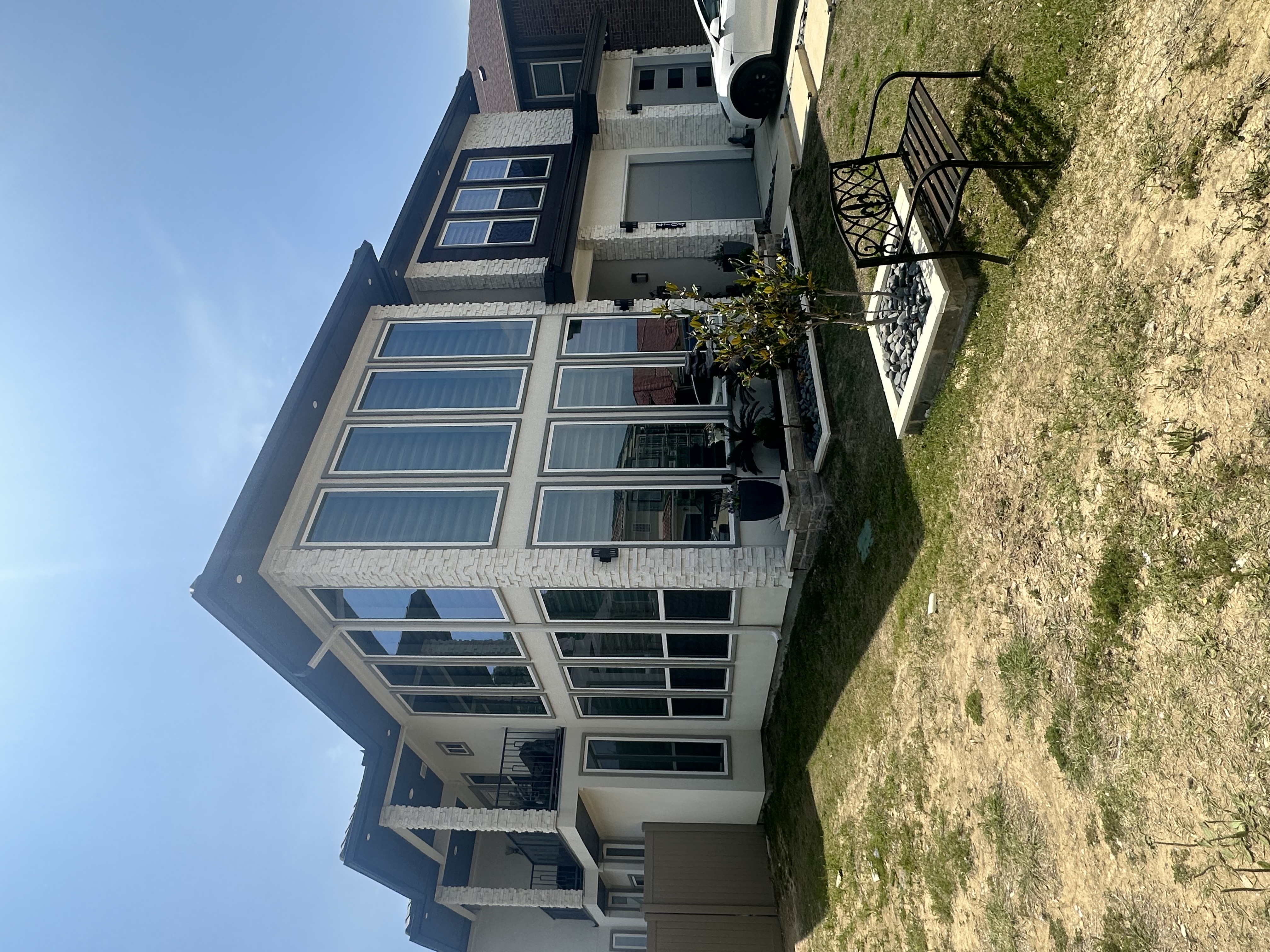 Traditional home exterior with tinted windows