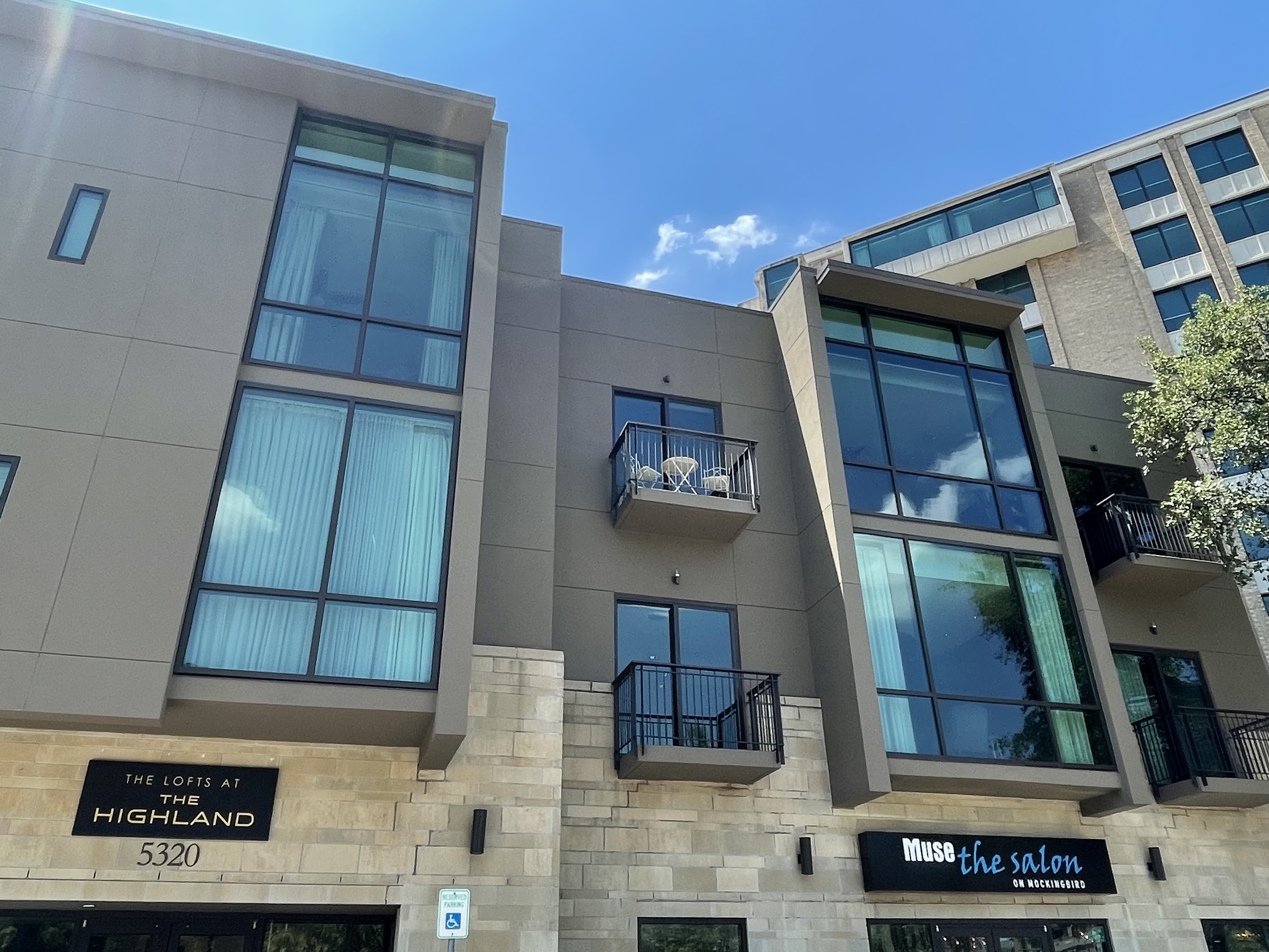 The Highland Lofts building with tinted windows